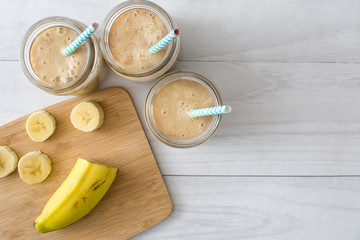 Banana smoothie on wood
 