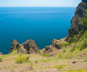 Tranquil coastal landscape on Karadag volcanic mountain range, Black Sea shore in Crimean peninsula