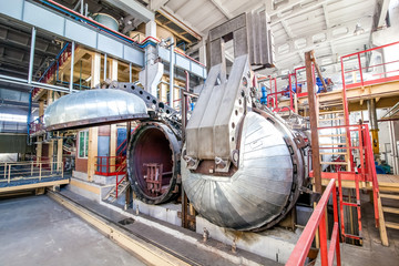 industrial equipment at the factory in large  production hall