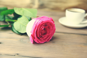 Coffee with pinke rose