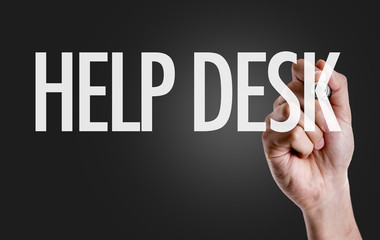 Hand writing the text: Help Desk