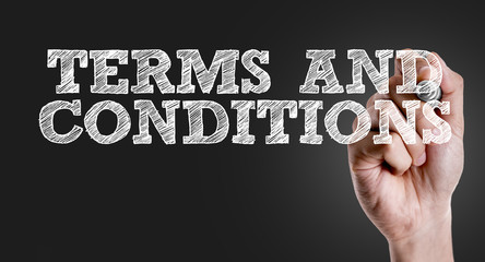 Hand writing the text: Terms and Conditions