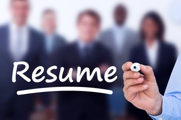 Composite image of concentrated businessman writing with marker