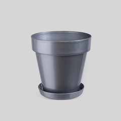 Gray empty flowerpot isolated on white. Studio Shoot with clipping path.