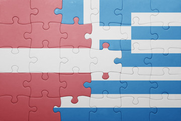 puzzle with the national flag of latvia and greece