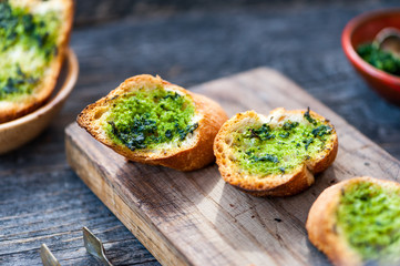 Garlic bread with wild garlic leaves