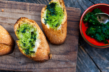 Garlic bread with wild garlic leaves