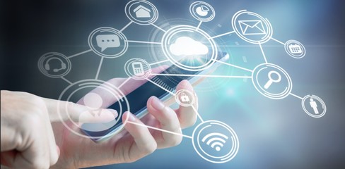 Composite image of hand holding smartphone