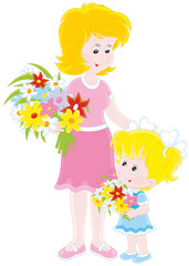 A little girl and her mum with bouquets of flowers
