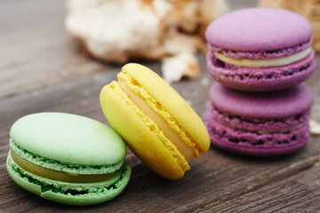 Set of sweets from cookies macaron on wooden table