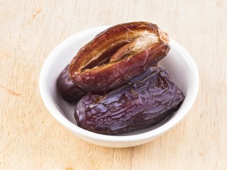 sweet date fruit  on wooden background