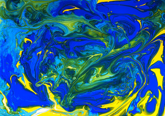 Abstract artistic texture generated using liquid colors and, natural laws of science. Colorful design with a detailed texture of colors mixing in patterns.