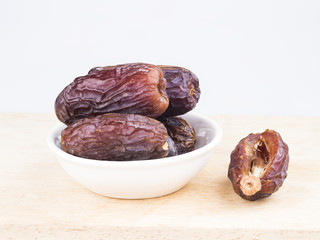 sweet date fruit  on wooden background