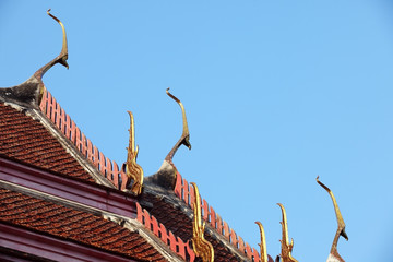 temple roof against blue sky