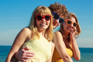 Group friends boy two girls having fun outdoor