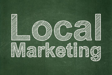 Marketing concept: Local Marketing on chalkboard background