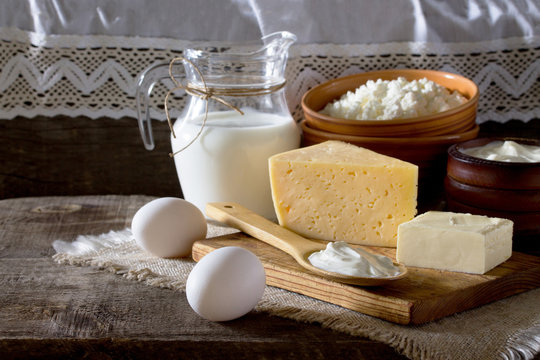 Dairy products on the table in a rustic style, with space for te