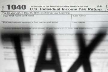 Fototapeta premium Tax forms background with Tax shadow