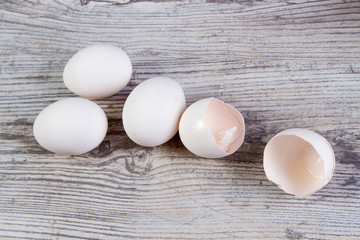 top view of the eggs lying on a wooden table