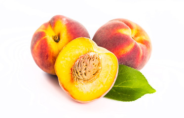 Peach. Fruit with slice isolated on white background