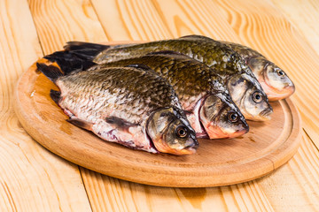 raw fish on a chopping board