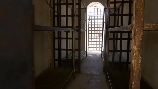 POV shot of walking into a jail cell