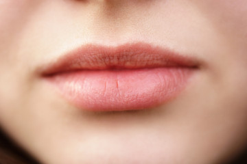 Fototapeta premium natural young girl lips without makeup closeup, macro photo shallow focus