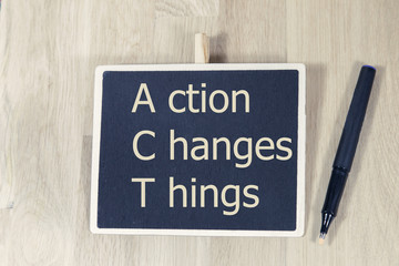 sentence Action Changes Things written with chalk on a blackboard, on a table with pen