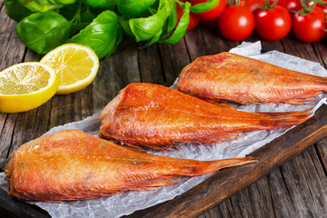 Red Sea Bass on parchment paper, close-up