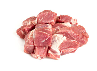 raw pork neck meat cut in pieces isolated on white