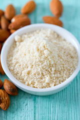 almond flour on wooden surface