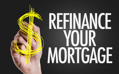 Hand writing the text: Refinance Your Mortgage