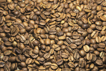 A coffee mug of coffee beans