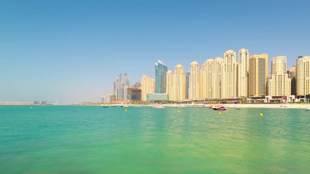 sun light dubai city marina panorama 4k time lapse jbr united arab emirates
