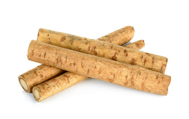 Burdock roots on white background