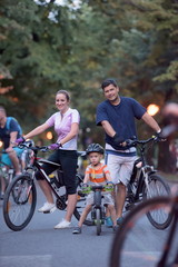 Fototapeta premium young family with bicycles