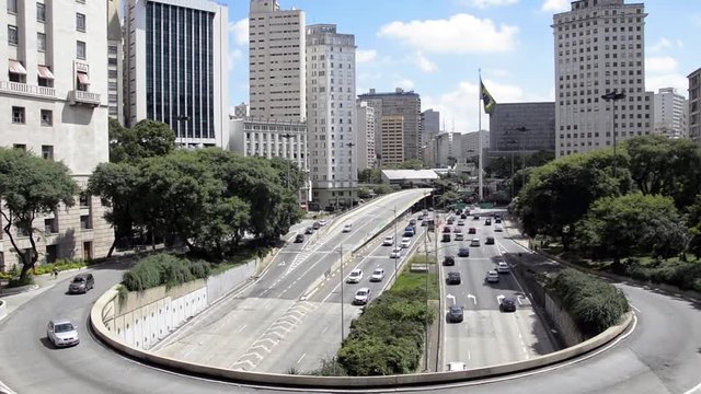 Traffic of cars in Avenue 23 may, downtown of city  of Sao Paulo, Brazil.