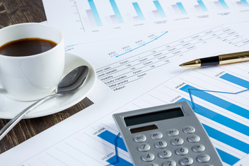 Financial charts and graphs on the table