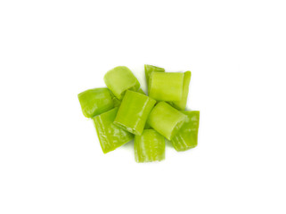diced green pepper on a white background