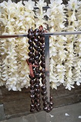 Fragrant white tuberose flower and kukui nut lei necklaces awaiting visitors in Hawaii