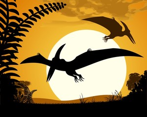 Pterodactyls silhouette on sunset background.   © Vladimir Zadvinskii