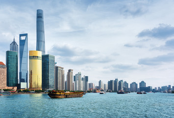Fototapeta na wymiar Self-propelled barges on the Huangpu River, Shanghai, China