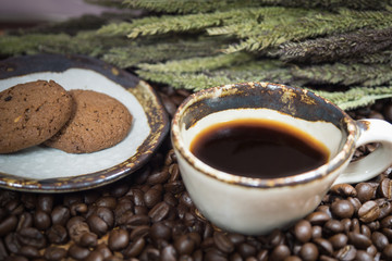 Coffee cup in coffee beans