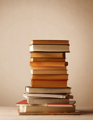 A stack of books with vintage background