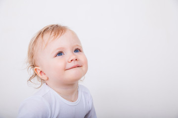 Happy baby isolated on white