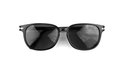 Cool sunglasses isolated on white background. In black plastic frame. Top view. Close up.