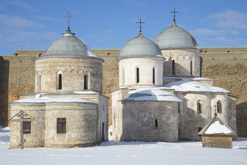 Two ancient church in the Ivangorod fortress sunny winter day. Ivangorod, Russia