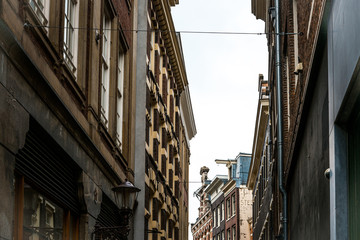 Fototapeta premium street view of Traditional old buildings in Amsterdam, the Nethe