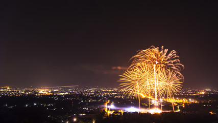 Beautiful firework display for celebration with city at night