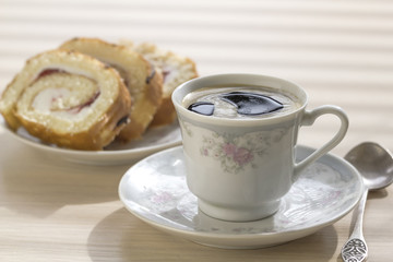 Cup of coffee and cake.